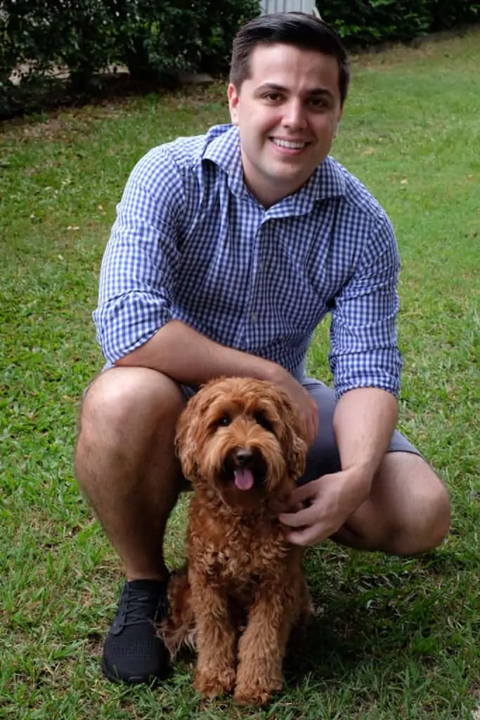 Chris the creator of oodle life and his Labradoodle puppy Max