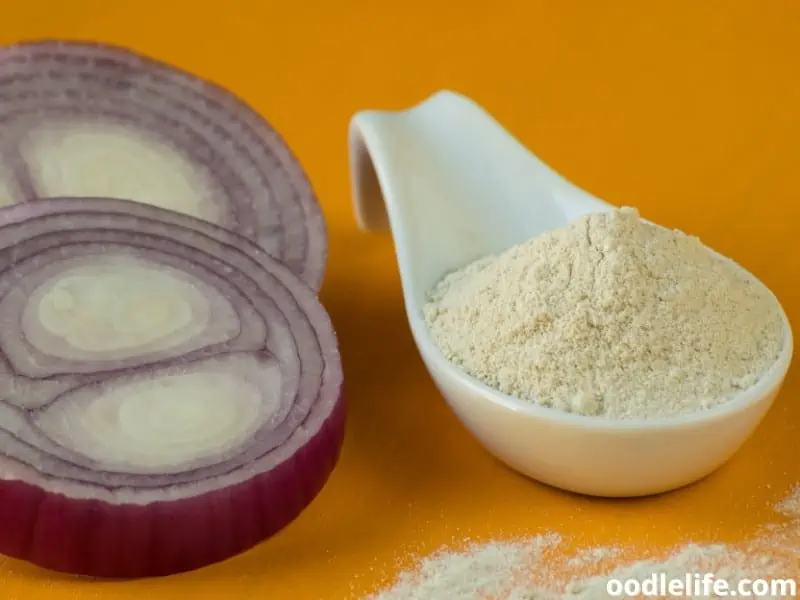 onion powder in white porcelain scoop