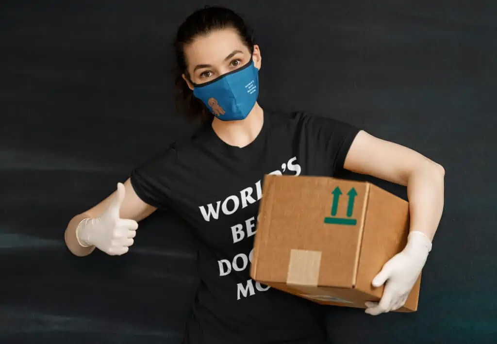 packing doodle dog gift orders wearing our mask