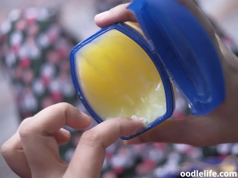 petroleum jelly in blue container