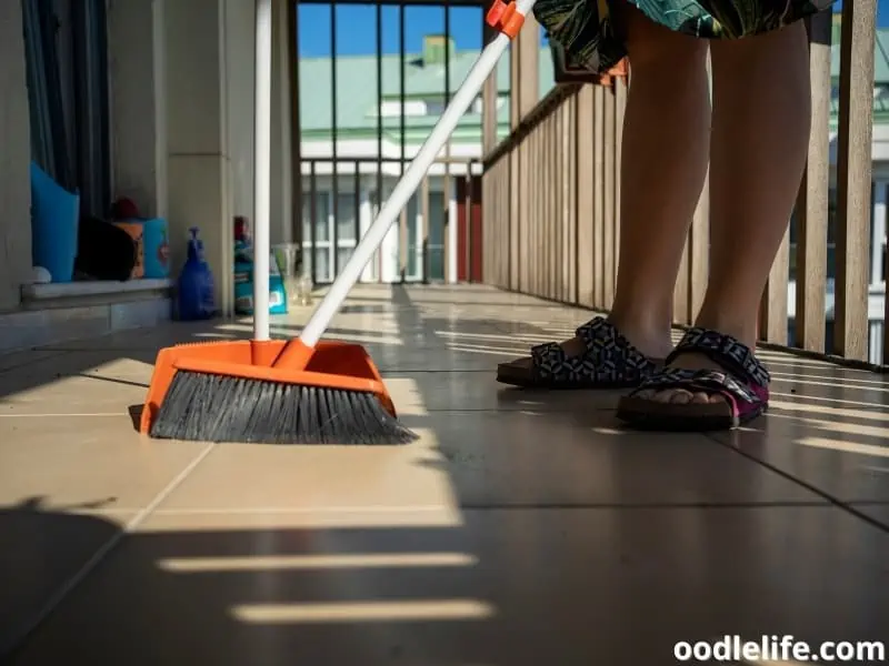 woman cleans the balcony