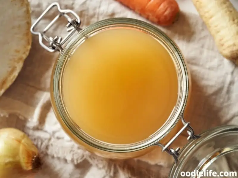 vegetables and bone broth in a jar